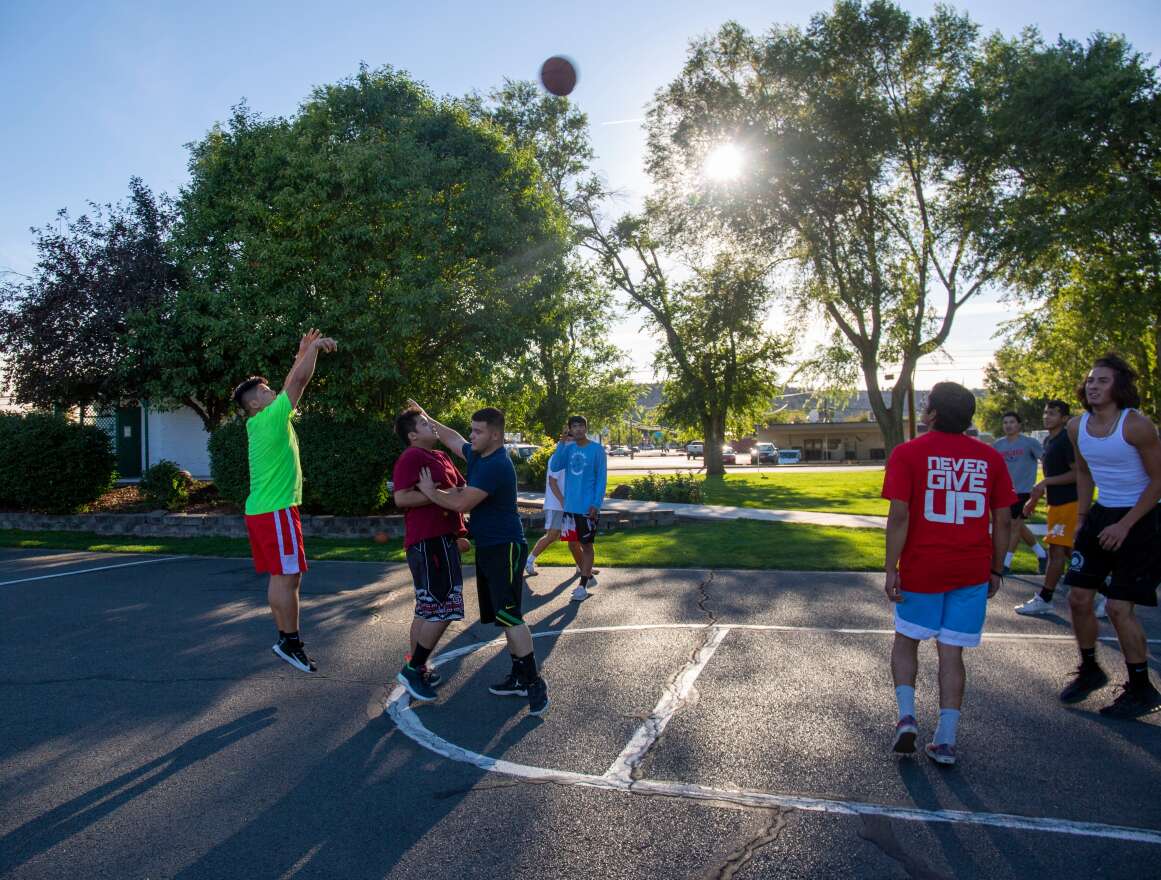 Dapril Miller shoots a three pointer in Madras, Ore., Sept. 1, 2020.